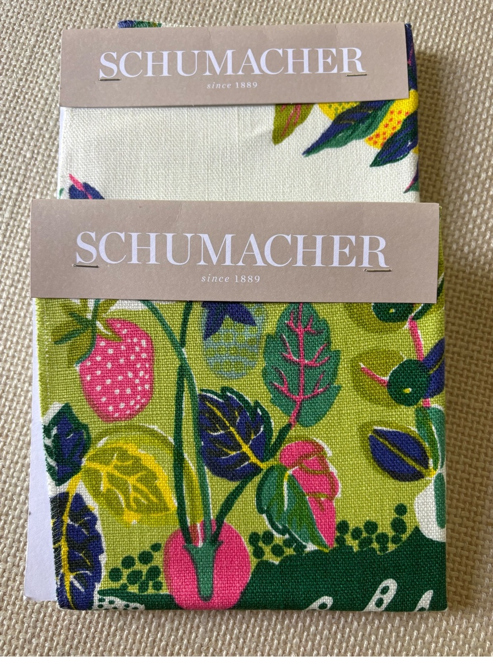Pair of Schumacher “Citrus Garden” fabric samples.